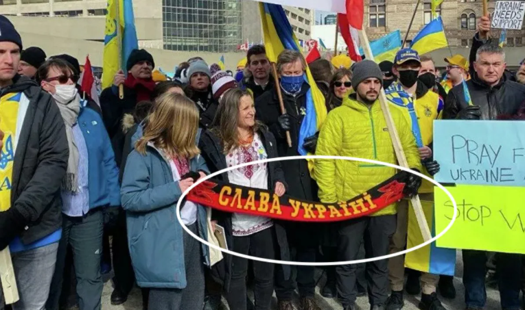 Chrystia Freeland with Banderite banner, Vancouver 2022